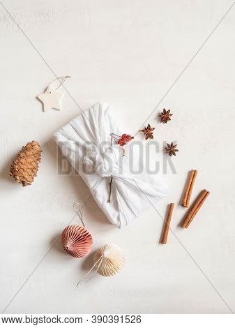 Eco-friendly Fabric Reusable Gift Nture Branch On White Background. Christmas Reusable Sustainable G