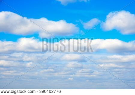 Large White Clouds On A Blue Sky Background, Textured