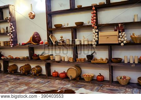 Pantry With Wooden Utensils And Food On The Shelves In The House, Textured