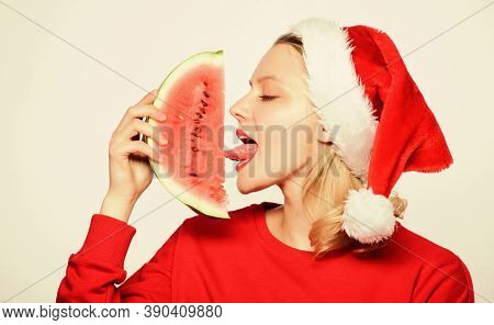 Christmas Girl Eat Watermelon. Prolong Summer. Travel Christmas Vacation And Holidays Resort. Delici