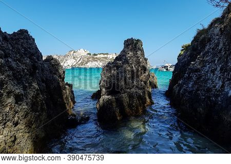 Tremiti Islands, Puglia, Italy, July 2020: View Of San Nicola Island Trought The Rock Of Cala Delle 