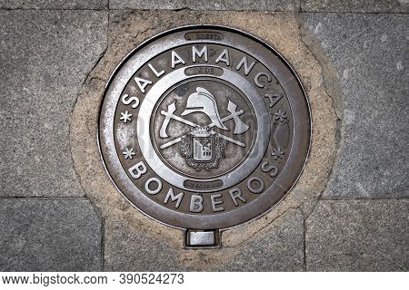 Salamanca, Spain, July 2020 - Iron Manhole Cover For Firemen (translation Of Bomberos) In The City O