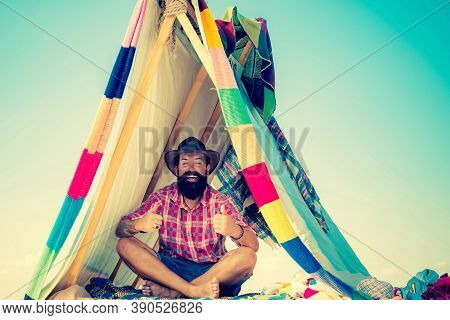 Camping. Homemade Tent Camping For Free Man. Travel Homemade Tent. Hut Of Branches. You Cant Buy Lov
