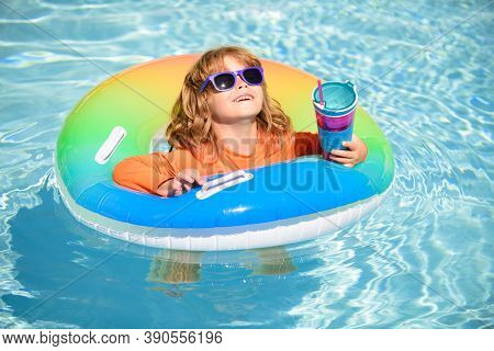 Summer Vacation Fun. Cocktail On Watter Pool In The Summer. Funny Portrait Of Child. Kid Having Fun 
