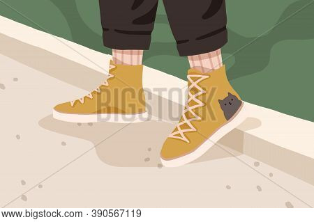 Womans Or Mans Yellow Trendy Gumshoes. Female Or Male Legs In Stylish Comfortable Flat Sole Urban Fo