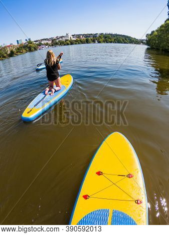 Prague, Czech Republic - August 06, 2020. Paddleboarding In Vltava - Moldau River In Prague Under Vy
