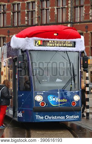 Amsterdam, Netherlands - December 6, 2017: People Ride The Gvb Electric Tram (combino Model Made By 