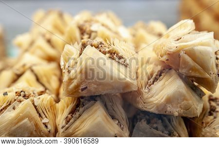 Baklava Pieces On Display. Rich, Sweet Pastry Made Of Layers Of Filo Filled With Chopped Nuts, Sweet