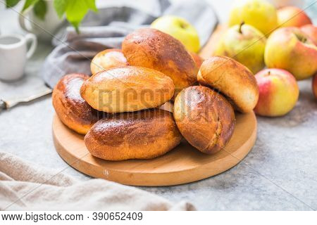 Ready-made Baked Pies (pirogi) With Apple. Traditional Russian Cuisine. Ready-made Baked Pies (pirog