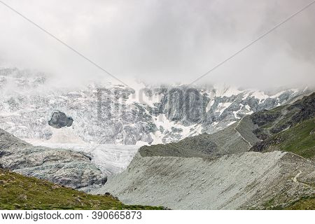 Aerial View Of Mountainscape Below Lac De Moiry In The Swiss Alps. Ch Switzerland.
