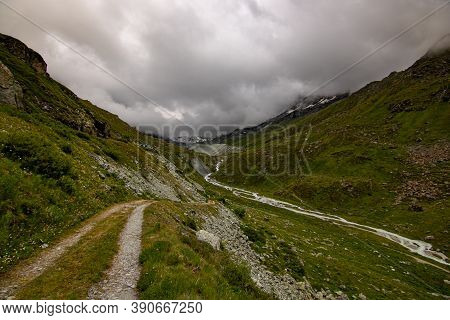 Aerial View Of Mountainscape Below Lac De Moiry In The Swiss Alps. Ch Switzerland.