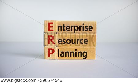 Concept Words 'erp, Enterprise Resourse Planning' On Cubes On A Beautiful White Background. Business