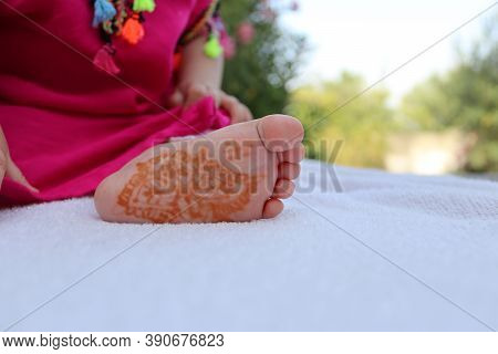 Close Up Of The Charming Small Newborn Baby Feet On A White Blanket. Little 6 Months Newborn's Feet 