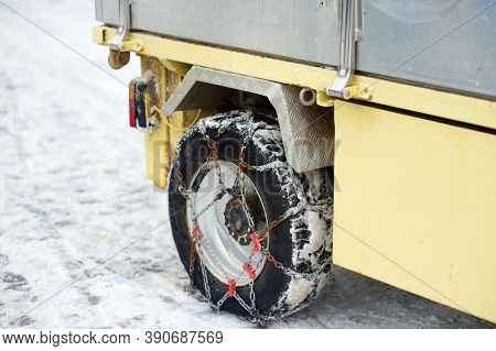 Saas Fee, Switzerland - February 4, 2020: Chains On The Wheels Of A Company Car In The Mountain Reso