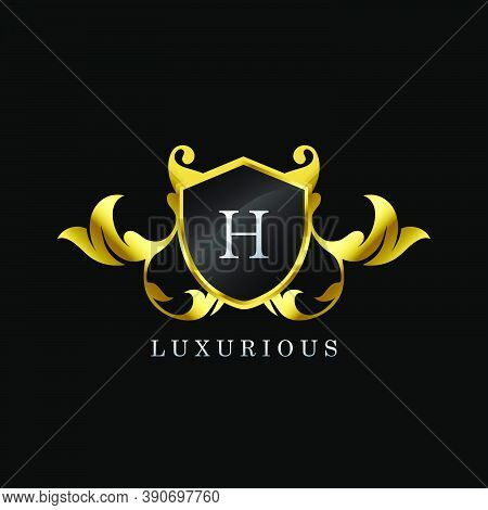 Golden Luxury Shield H Letter Logo. Elegance Logo Vector Template Made Of Wide Silver Alphabet Font 