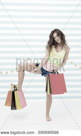 Shopping Advert. Funny Girl Advertising Shopping Sale. Funny Girl Pointing On Papaerbags. Advert Of 