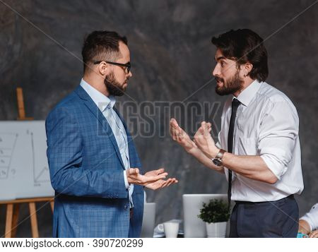Caucasian Colleagues Disputing Having Disagreement At Work Blaming Each Other In Mistake, Diverse Co