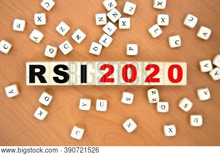 Word Concept Written On A Light Table And Light Background. Concept Word Rsi 2020 On Cubes On A Beau