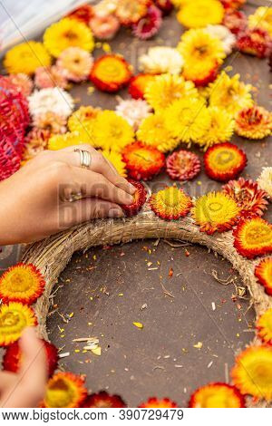 Florist At Work, Stick Strawflower Onto The Autumn Wreath