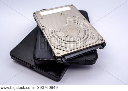Hdd - Stack Of External And Internal Laptop Hard Disk Drives Isolated On White Background. Pile Of L