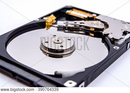 Internal Parts Of A Hard Disk Isolated On A White Background. Close Up Of Hard Disk Drive Inside Vie