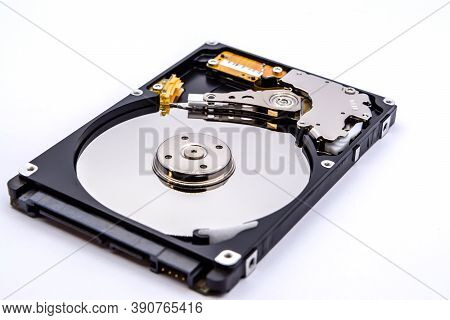 Internal Parts Of A Hard Disk Isolated On A White Background. Close Up Of Hard Disk Drive Inside Vie