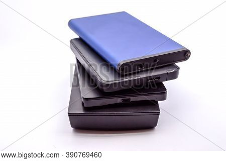 Hdd - Stack Of Portable Hard Disk Drives Isolated On White Background. Pile Of External Hard Disk Dr