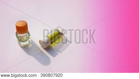 Two Small Perfume Or Attar Bottles Isolated In White Background With Selective Focus