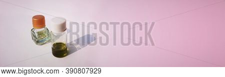 Two Small Perfume Or Attar Bottles Isolated In White Background With Selective Focus