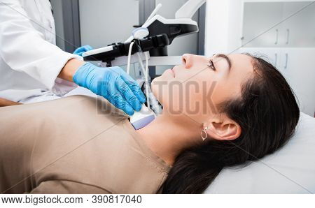 Female Patient Receives Thyroid Diagnostics. Treatment Of Thyrotoxicosis, And Hypothyroidism