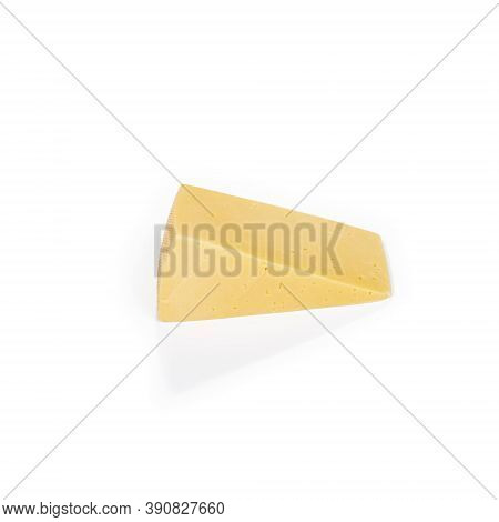 Shooting In The Studio. A Piece Of Yellow Cheese, Cut From The Head. Close-up. On White Background.