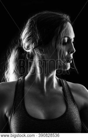 Slim Sexy Athletic Woman On Black Background