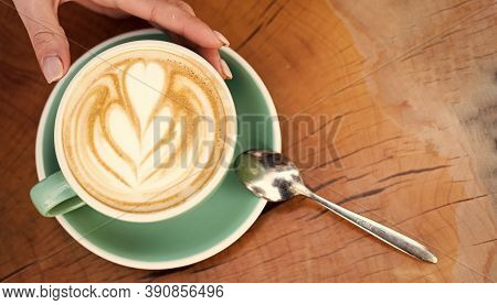 Design On Surface Of Latte. Challenge For Latte Artist. Top View Coffee Cup On Wooden Table. Beautif