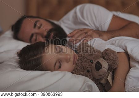 Bearded Mature Man Sleeping In Bed With His Little Daughter. Single Father Sleeping With His Child. 