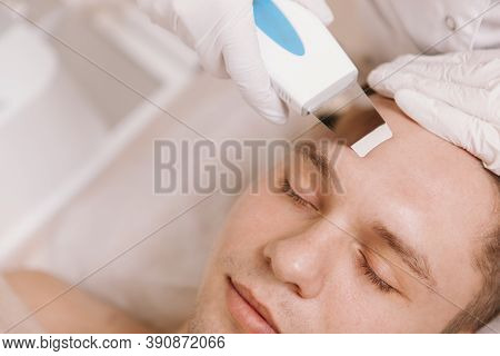 Cropped Shot Of A Young Man Having Ultrasound Skin Cleansing Procedure At Beauty Salon