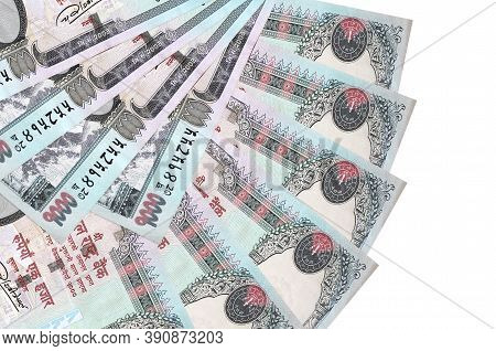 1000 Nepalese Rupees Bills Lies Isolated On White Background With Copy Space Stacked In Fan Shape Cl