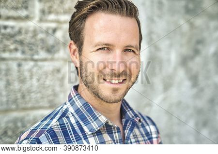 Portrait Of A Trendy Young Man In The City Concreate Background