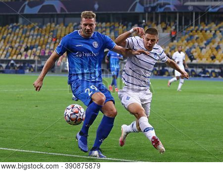 Kyiv, Ukraine - September 29, 2020: Laurent Depoitre Of Gent (l) Fights For A Ball With Vitaliy Myko