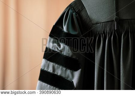 Phd Graduate In Black Gown University Degree