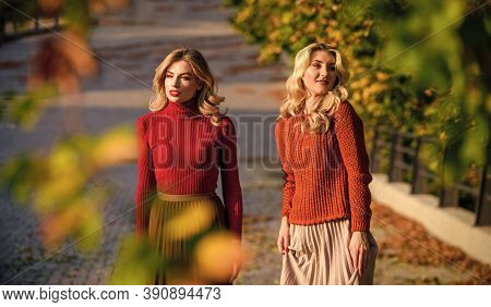 Autumn Season. Fall Fashion Season. Pleated Trend. Girls In Corrugated Skirt And Sweater. Female Bea