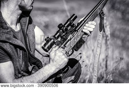 Hunter Is Aiming. The Man Is On The Hunt. Hunting Period. Male With A Gun. Close Up. Hunter With Hun