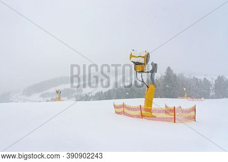 Modern Snow Cannon On A Ski Slope At Snowstorm