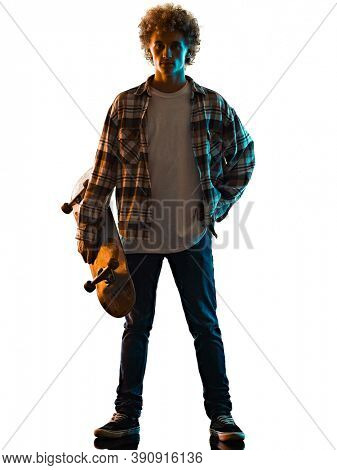 one cauacsian young man skateboarder Skateboarding in studio silhouette shadow isolated on white background