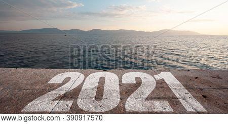 Greeting Card Decorated For New Year 2021 And Christmas. Landscape Scenery With 2021 On The Road. Wa