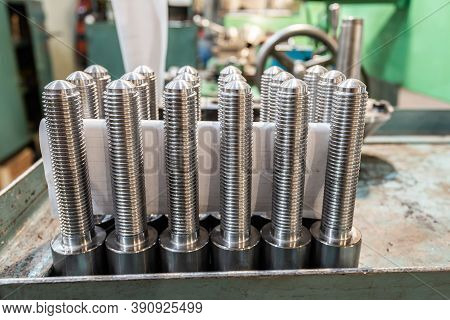 Bolts, Screws And Threaded Rods After Turning On A Rack.