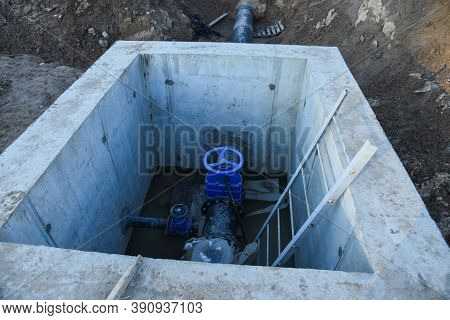 Resilient Seated Gate Valves Connect Pipeline Of Water Supply In Concrete Bunker At Constructin Site