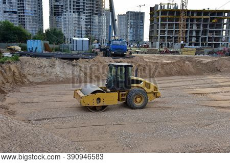 Vibro Roller Soil Compactor Leveling Ground At Construction Site. Vibration Single-cylinder Road Rol