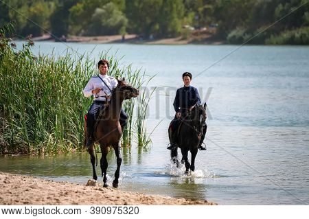 Starocherkassk, Russia - Circa September 2020: Two Young Don Cossack On Horseback