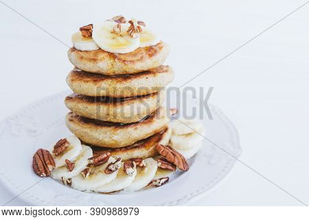 Stack Of Homemade Small Thick Pancakes Served With Fresh Blueberries.