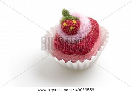 colorful felt praline on a white background